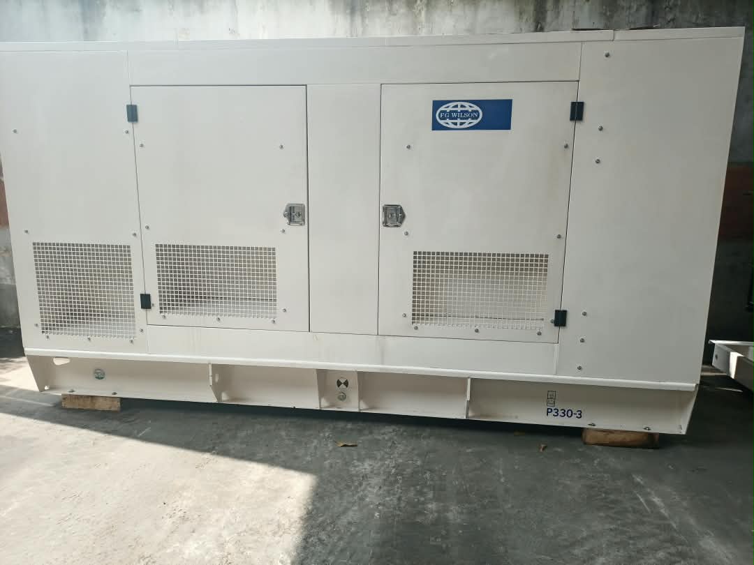 FG Wilson 300 kVA diesel generator in a large white soundproof canopy